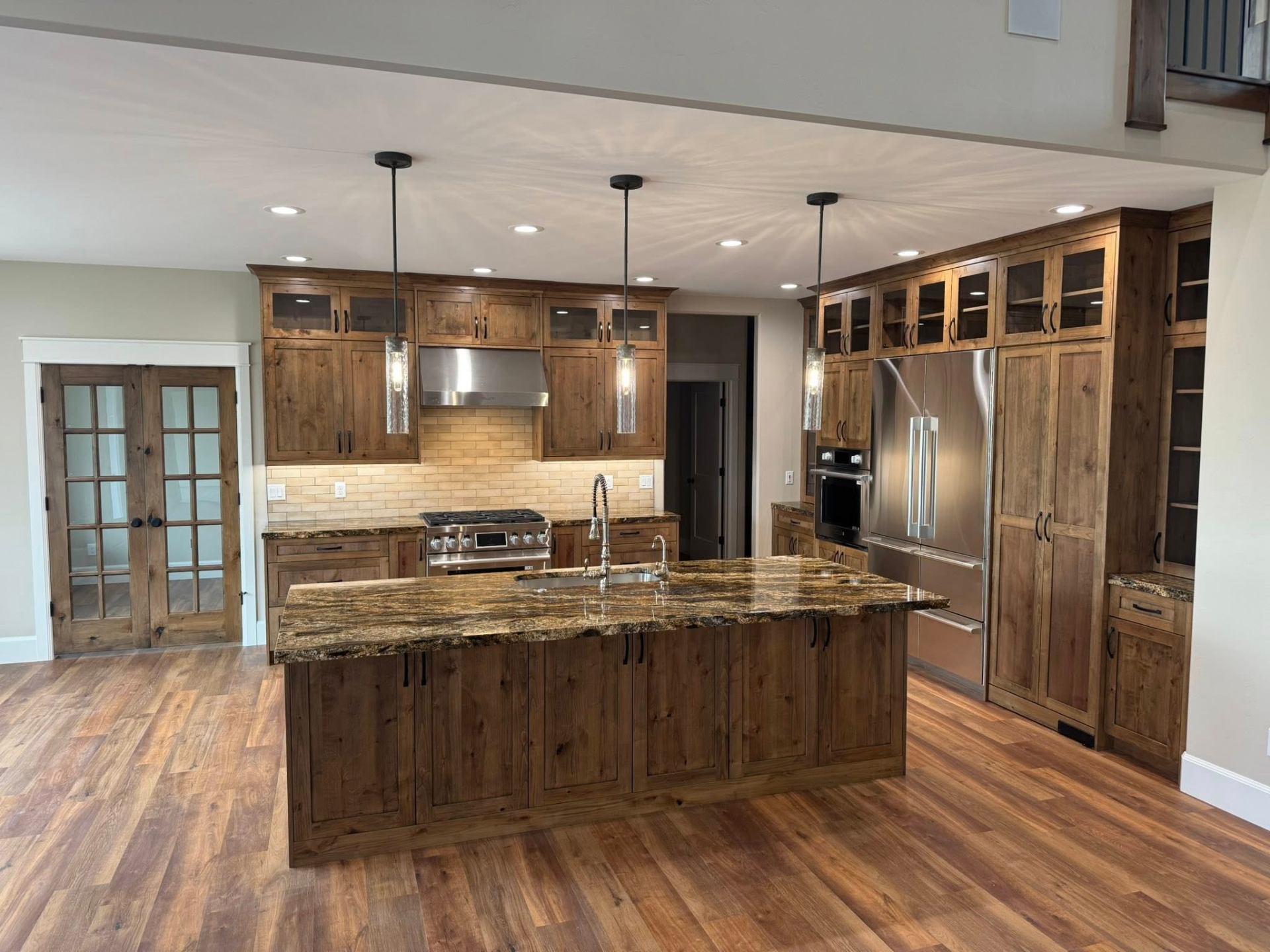 Knotty alder kitchen with granite island