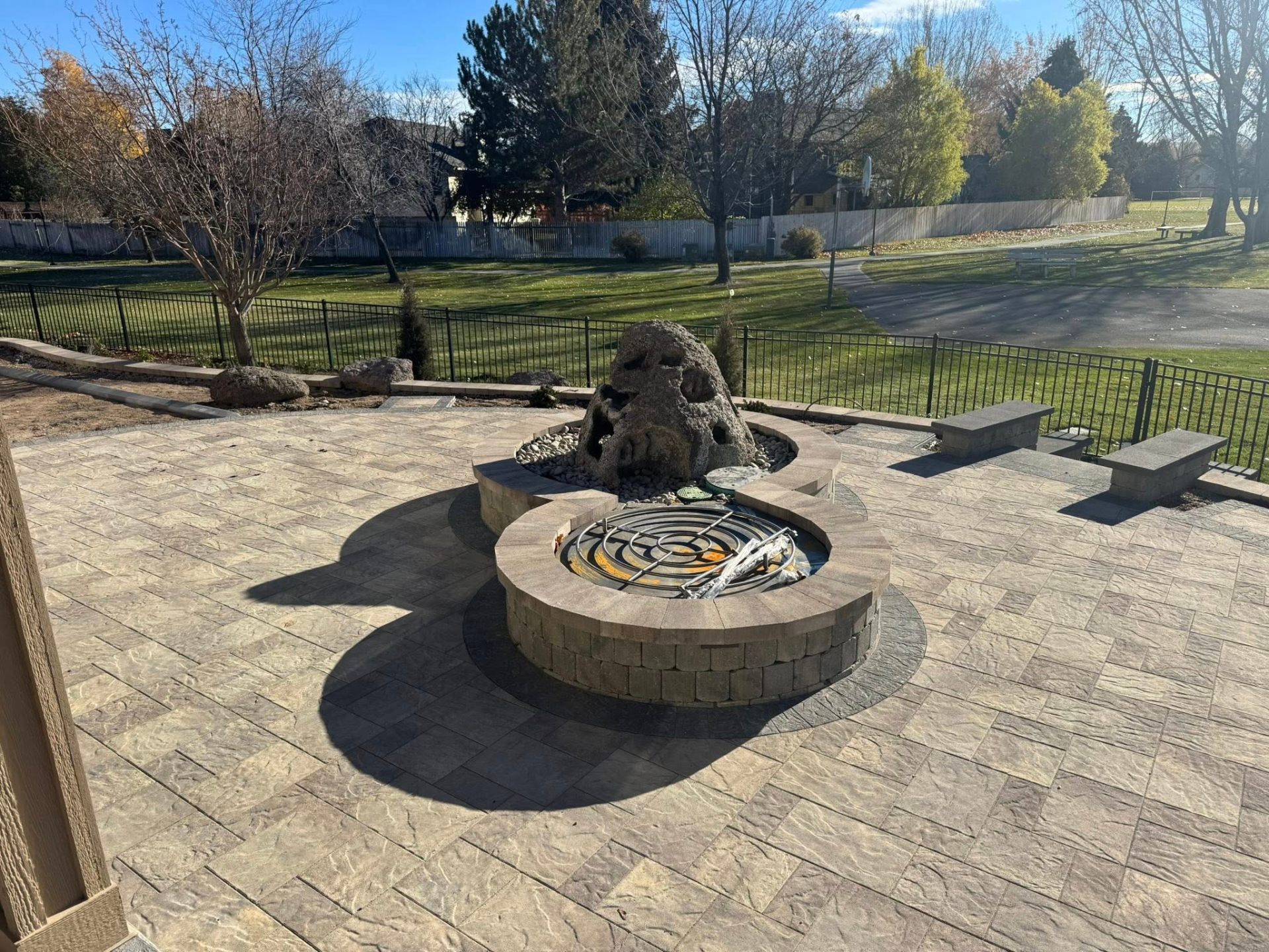 Custom paver patio with built-in firepit
